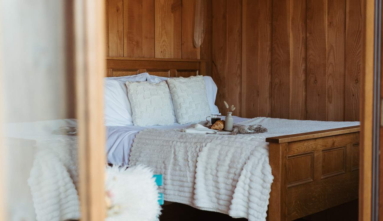 The king-size bed is perfect for resting your head after a busy day. 
