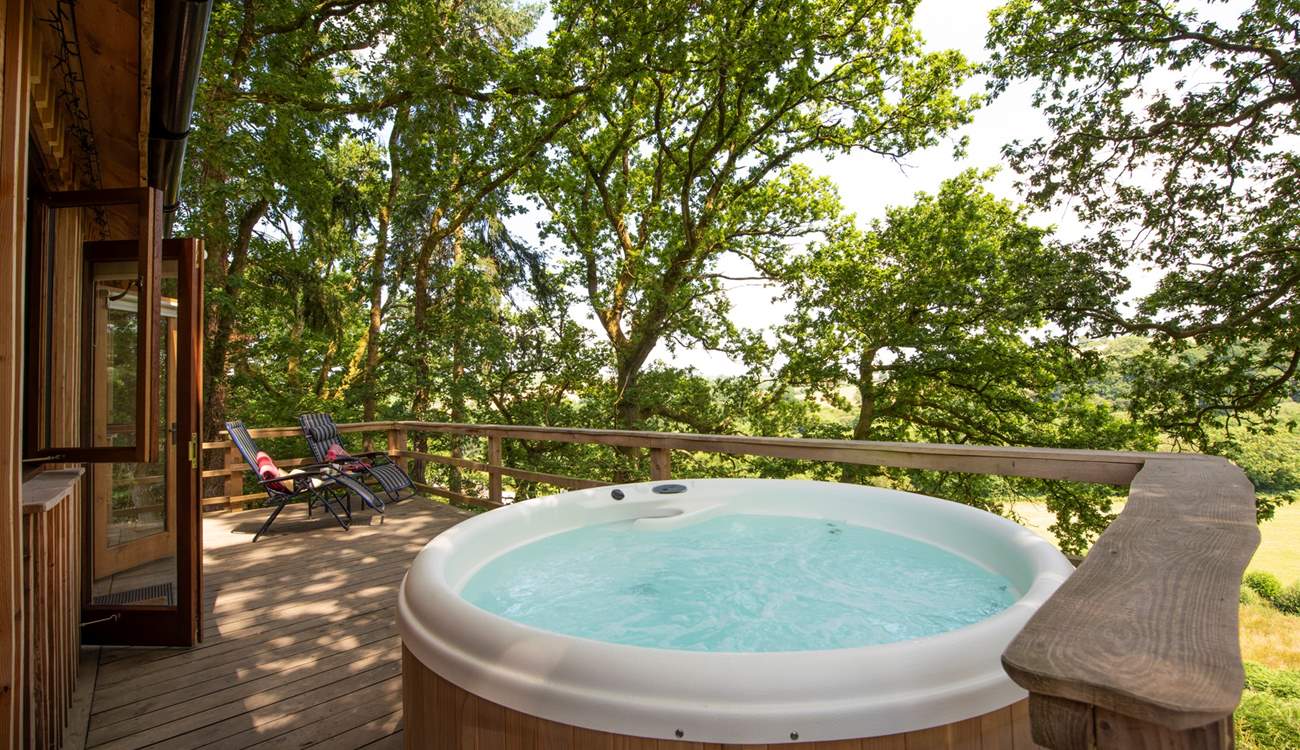 Introducing our tree top hideaway - Hazel. (Please note the hot tub now has a retractable cover)