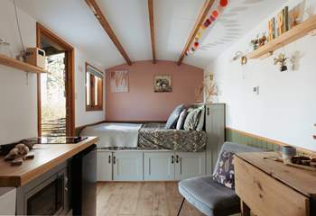 Sink into the sumptuous king-size bed, perfect for delightfully slow mornings watching the world go by.