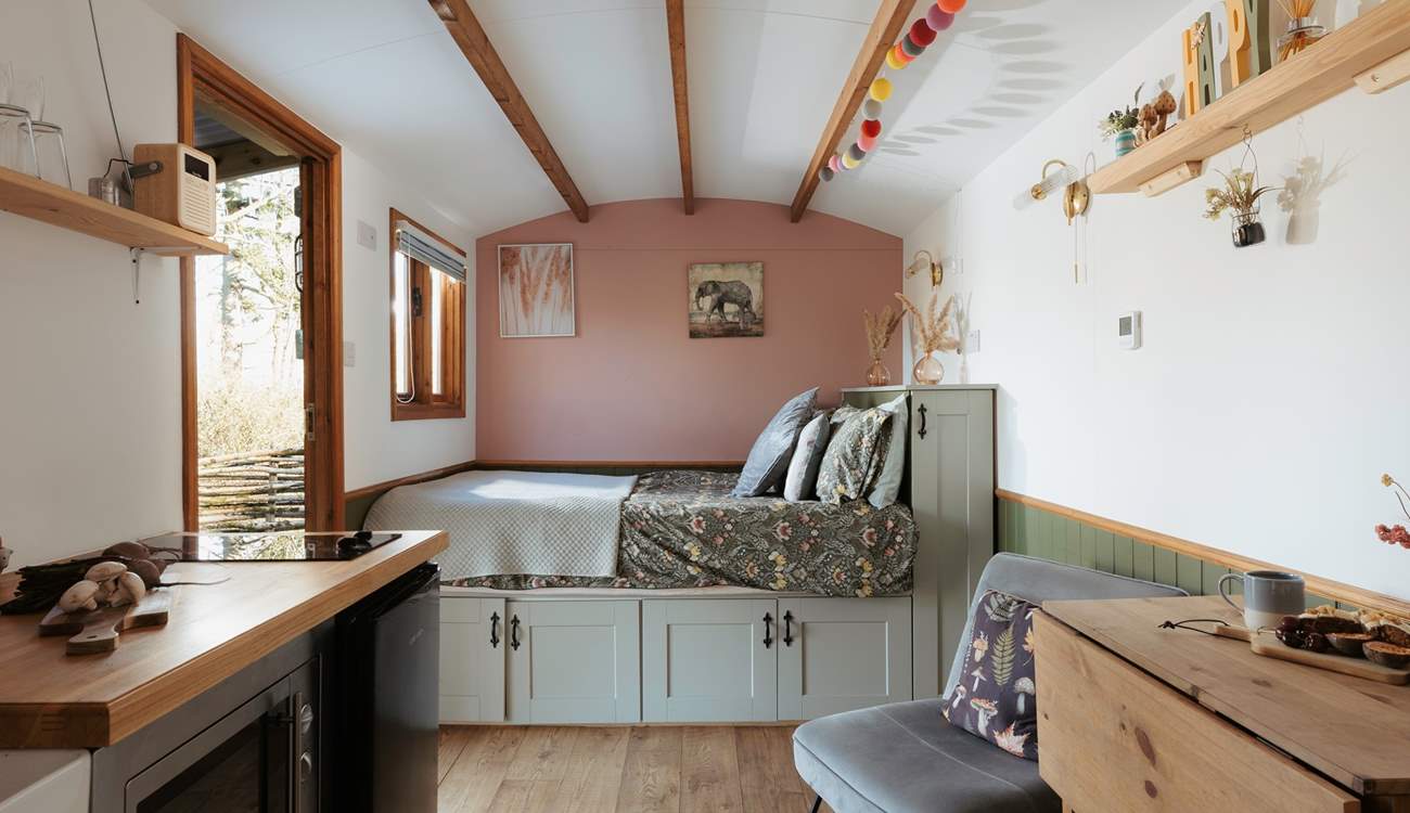 Sink into the sumptuous king-size bed, perfect for delightfully slow mornings watching the world go by.