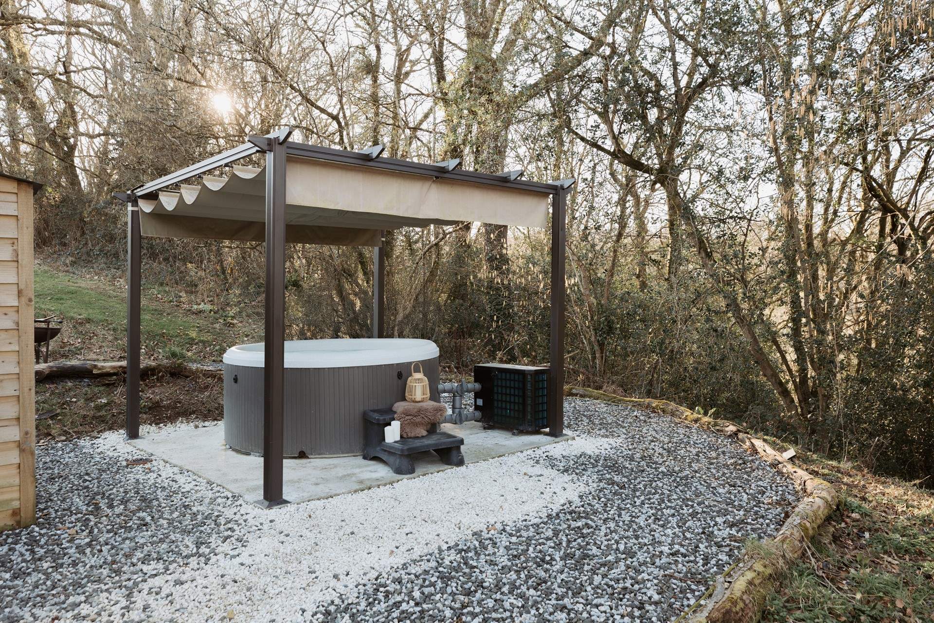 Spend sun-soaked afternoons unwinding in the the bubbling hot tub. 