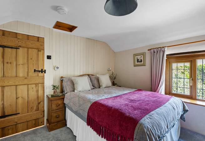 Snuggle under the covers of the double bed in bedroom 2.