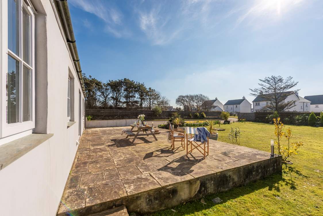 The sunny patio is the perfect place to relax.