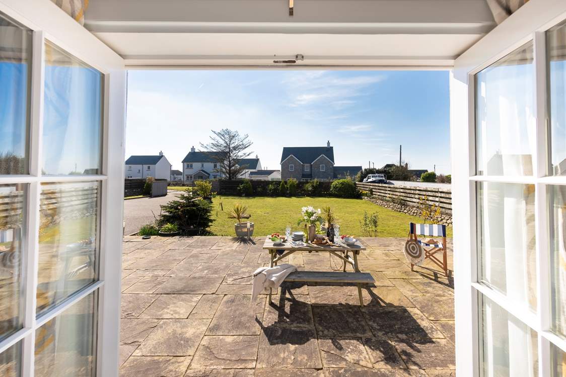 The entrance gates can be closed to create a secure space for the children and pooch to enjoy safely.