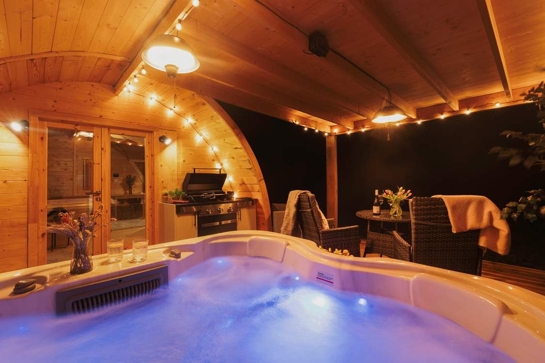 Sink into the bubbling hot tub as day turns to night.