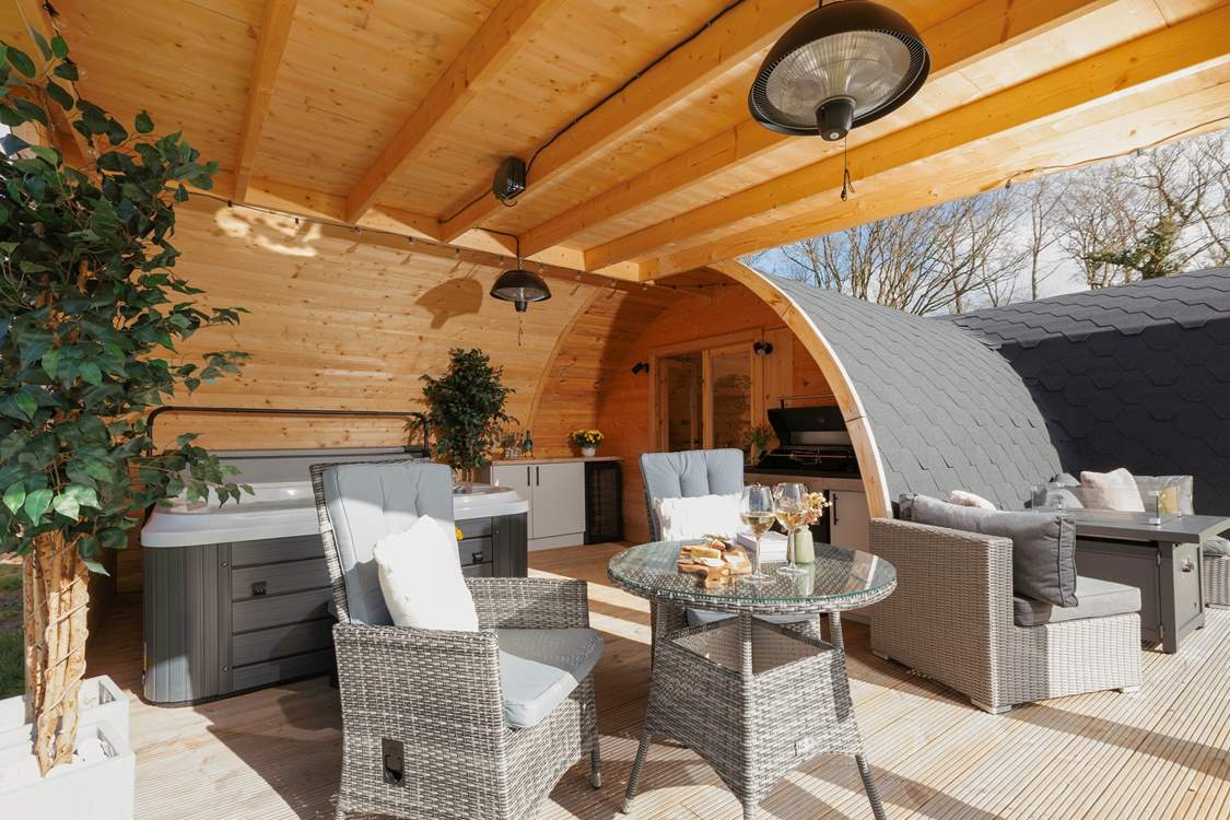 The covered deck allows for al fresco living whatever the weather.