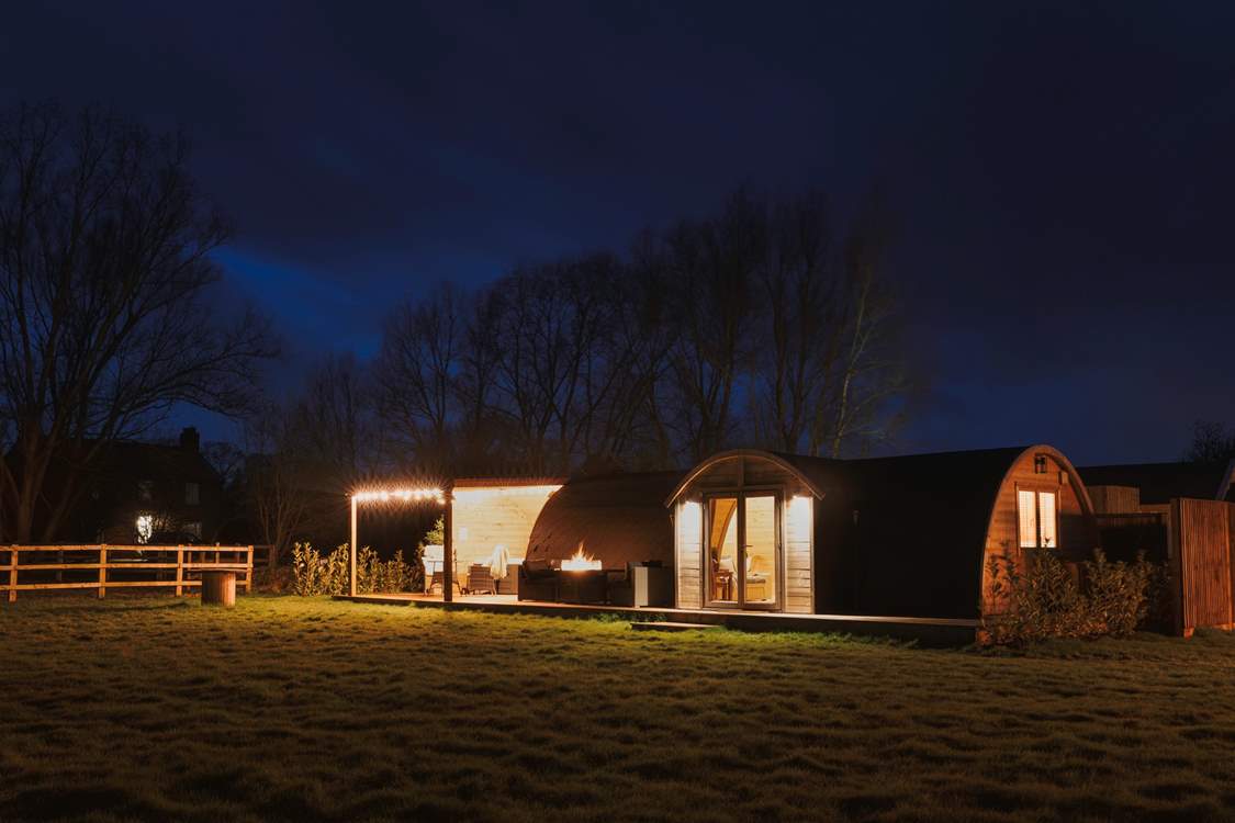 As night falls this handcrafted cabin becomes even more magical.