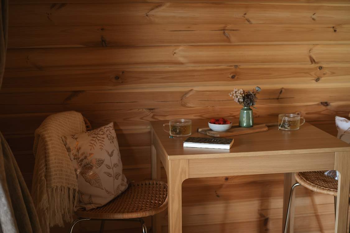 Take a seat at the dining-table and plan the day's adventures.