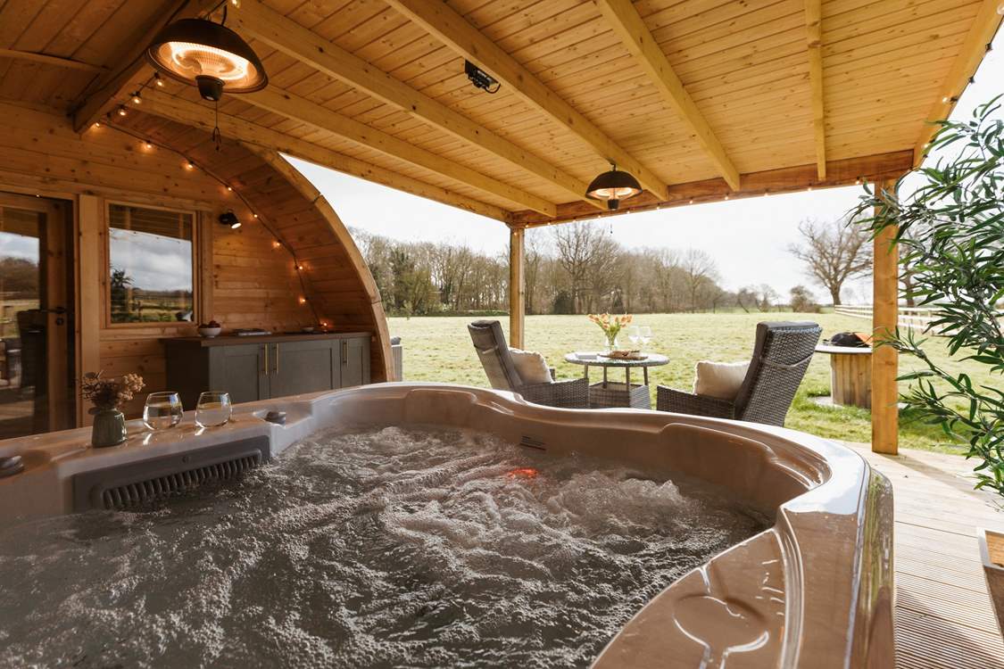 The covered decking allows for al fresco living whatever season you visit.