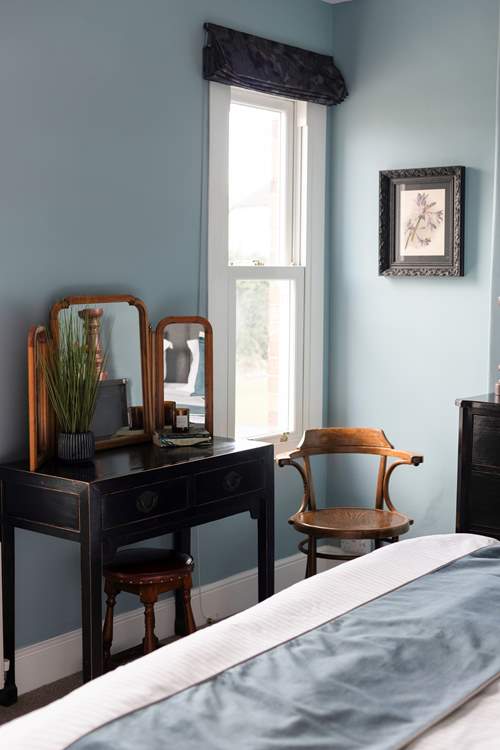 The stylish furniture suits the house well.