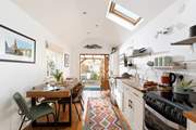 The stylish kitchen/diner leads straight out into the garden.