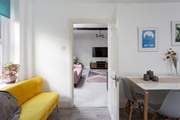 Through to the sitting-room.