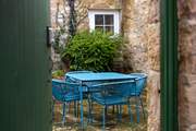 Enjoy a quiet glass of wine in the communal garden.