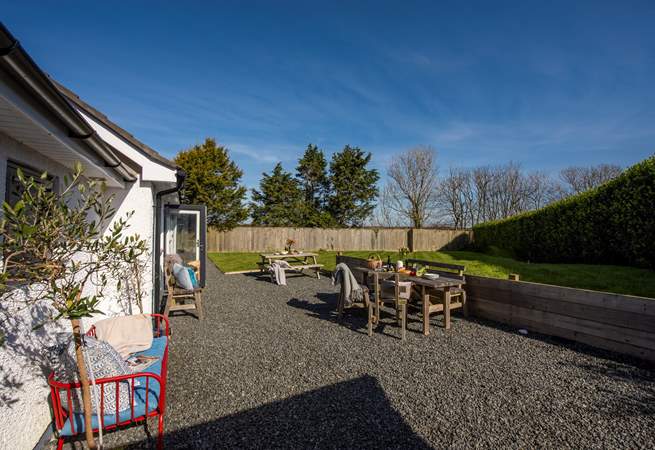The rear garden has an impressive lawn.