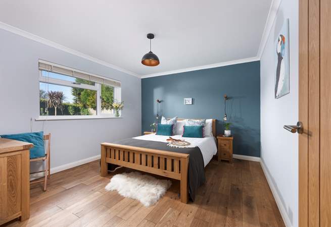 Bedroom 3 is a spacious room with a king-size bed.