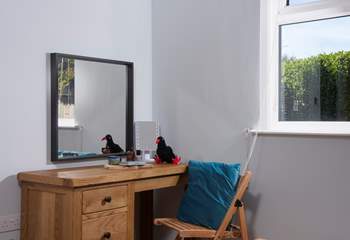 A perfectly placed dressing table or writing bureau. 