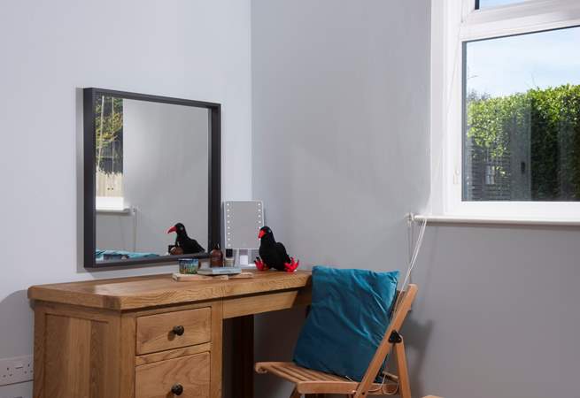 A perfectly placed dressing table or writing bureau. 