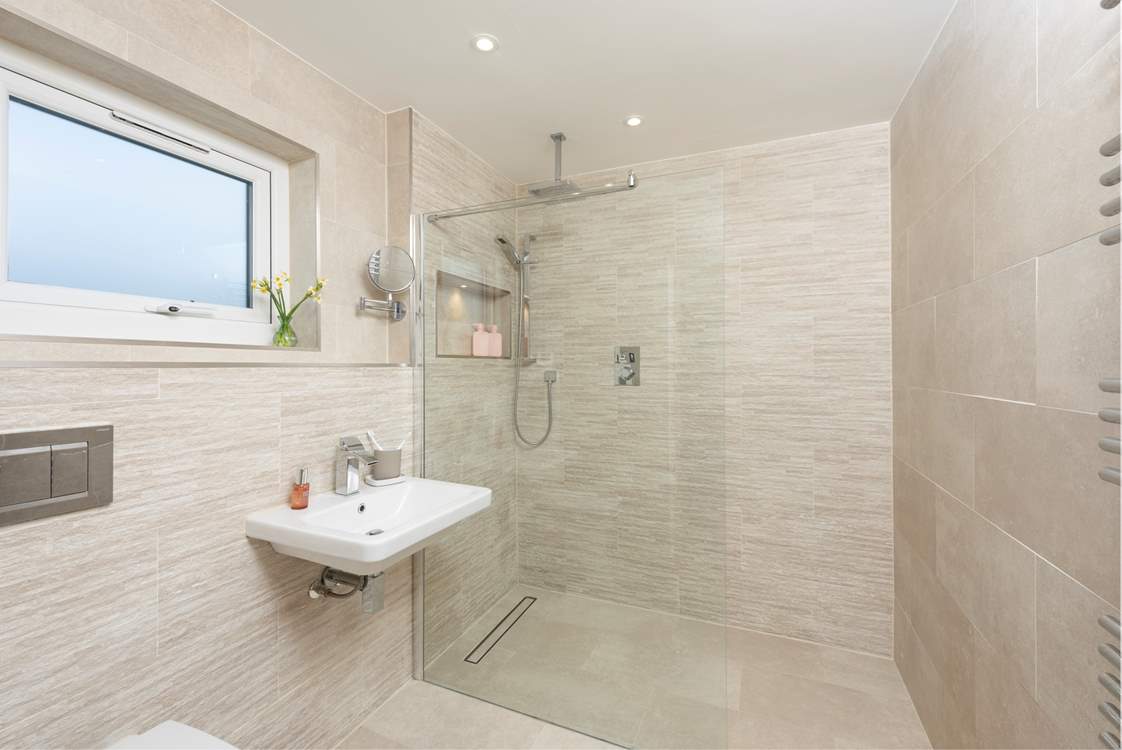 The wet-room is accessed via a small step.
