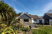 Looking back from the front lawn, take care on the steps and the unfenced edge.