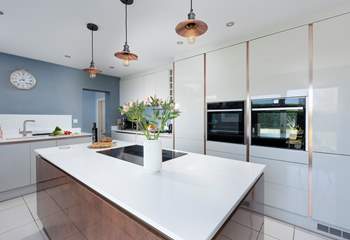 Complete with double oven and island.