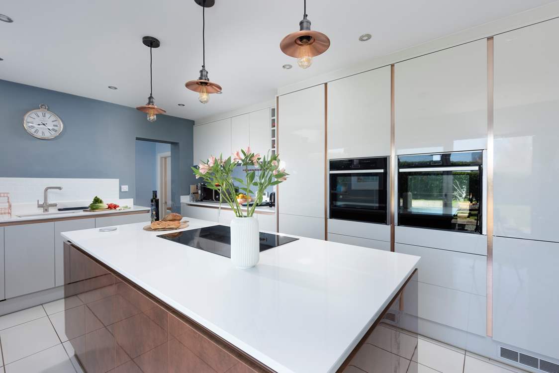 Complete with double oven and island.
