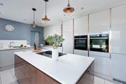 Complete with double oven and island.