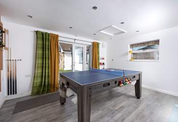 The games-room is situated in the front garden with separate outside access.