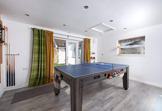 The games-room is situated in the front garden with separate outside access.