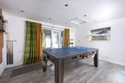The games-room is situated in the front garden with separate outside access.