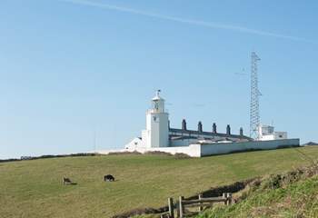 The Lizard Lighthouse is a sixteen minute drive, or less than two hours stunning hike along the coastal path.