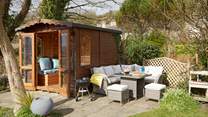 Make the most of outdoor living at the bottom of the garden.