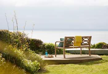 Lose yourself in the serene coastal scenery at the bottom of the garden.