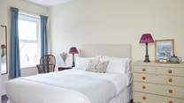 Dreamy and delicate this bedroom is a haven of relaxation.