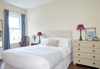 Dreamy and delicate this bedroom is a haven of relaxation.