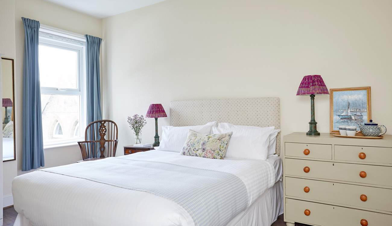 Dreamy and delicate this bedroom is a haven of relaxation.