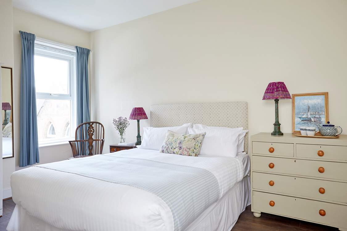 Dreamy and delicate this bedroom is a haven of relaxation.