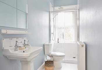 A clean and bright first floor shower-room ready to awaken the senses! 
