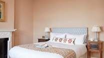 Sweet dreams await in this calming and beautifully decorated space.
