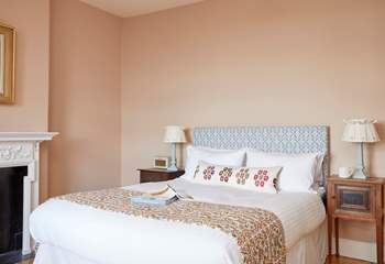 Sweet dreams await in this calming and beautifully decorated space.
