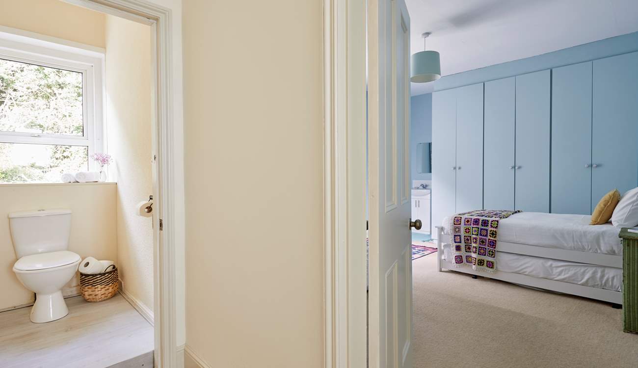 A glimpse into the handy first floor cloakroom and twin bedroom. 