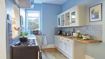 Imagine delicious meals prepared in this charming and well-designed kitchen. 