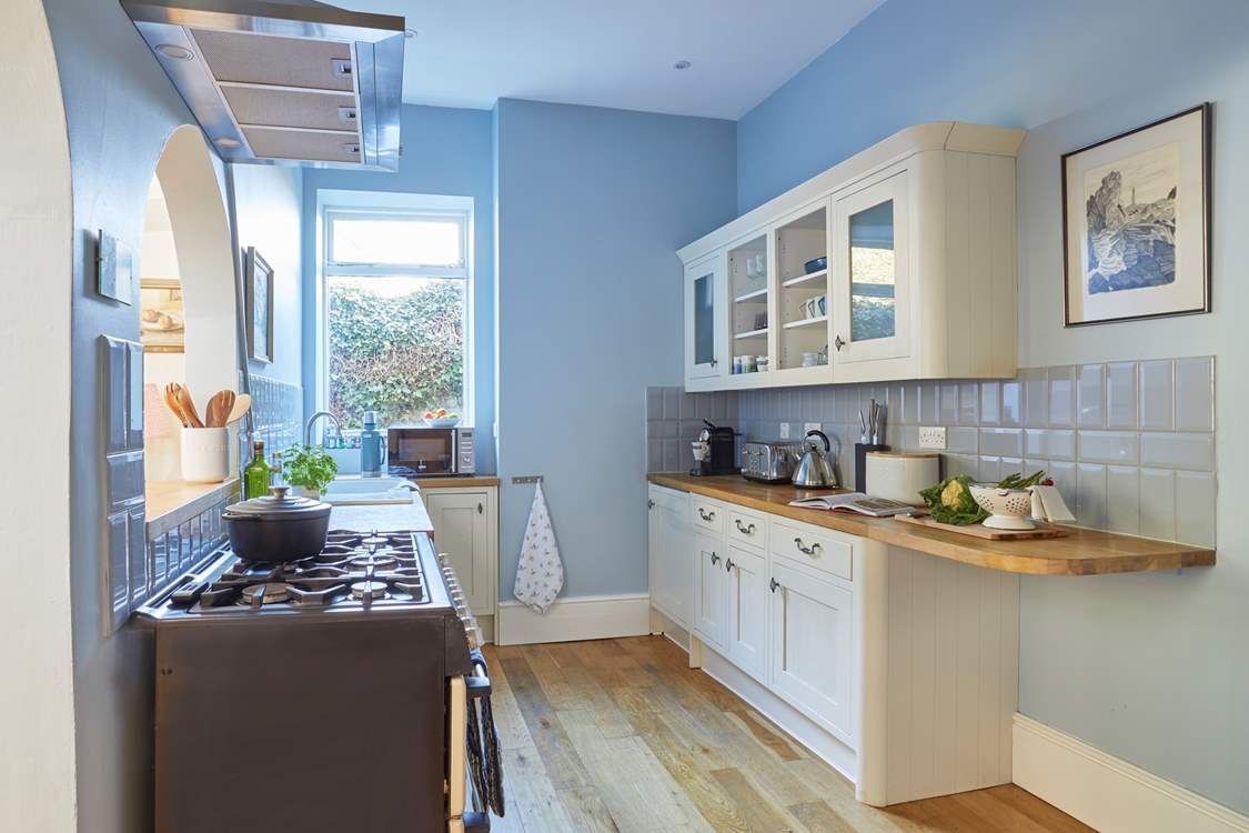 Imagine delicious meals prepared in this charming and well-designed kitchen.