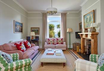 A blend of vintage flair and modern touches create this unique and welcoming sitting-room.