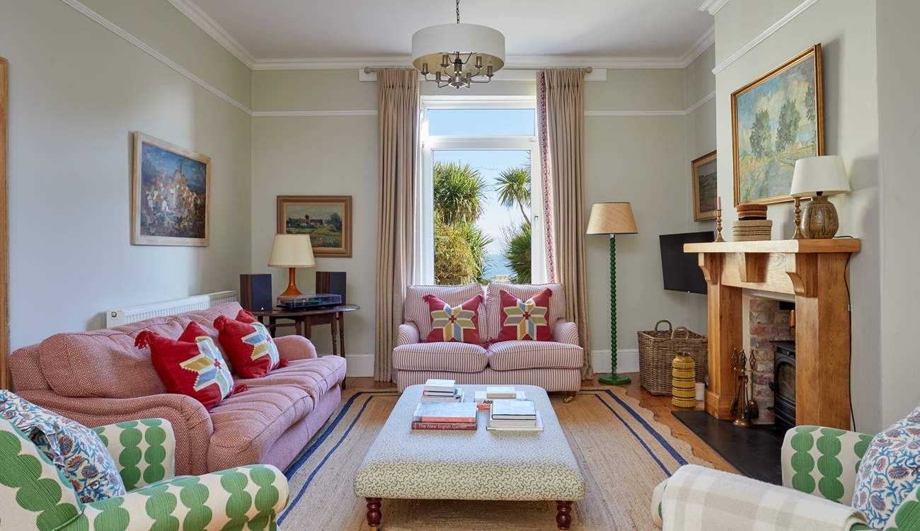 A blend of vintage flair and modern touches create this unique and welcoming sitting-room.