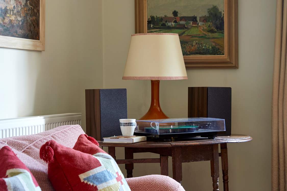 Vintage vibes and natural light create a perfect spot for relaxing entertainment.