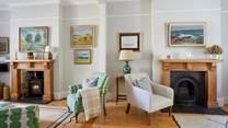 Perfectly balanced: the generous sitting-room showcases symmetry and harmony in its split design. 