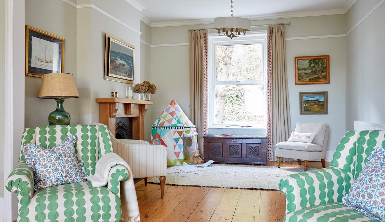 An extension of the sitting-room, where playtime meets stylish design in an inviting space.