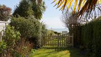 Please be aware, beyond the picket gates, the end of the garden is open to the edge with a steep drop. Please supervise children at all times.
