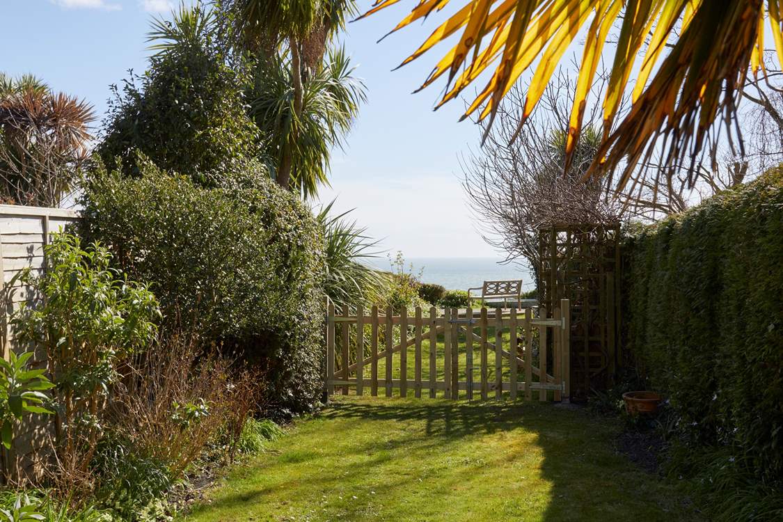 Please be aware, beyond the picket gates, the end of the garden is open to the edge with a steep drop. Please supervise children at all times.