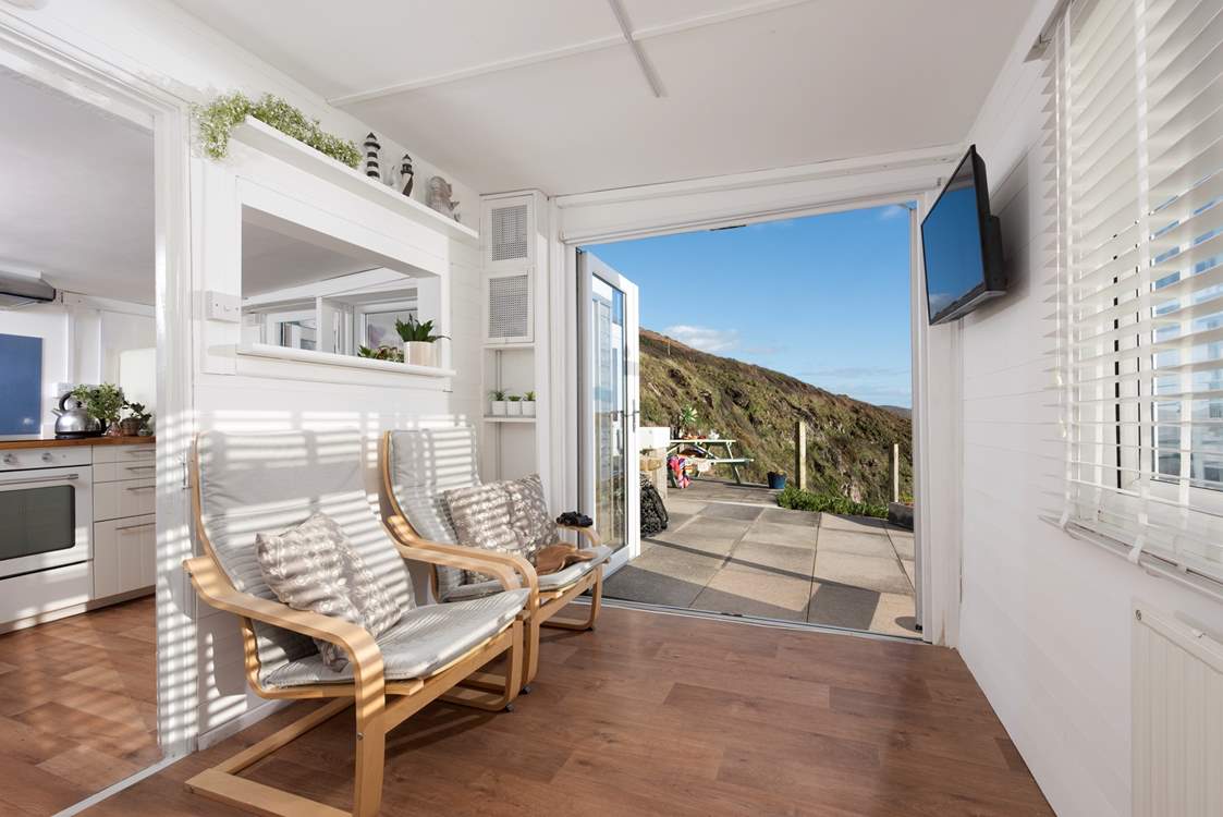 We can't believe you will want to watch the TV but if you need to, an internet TV is provided (a foldaway dining-table is also provided).